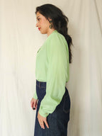 Vera - lichtgroene vintage blouse | M