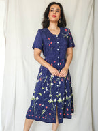 Simone - donkerblauwe vintage jurk met bloemen | M