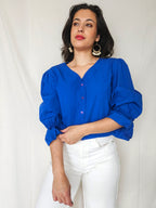 Dione - blauwe vintage blouse met pofmouwen | XL
