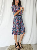 Donkerblauwe vintage jurk met bloemenprint | M