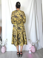 Zwierige gele vintage jurk met zwart patroon | L