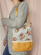 Vintage schoudertas met bloemen